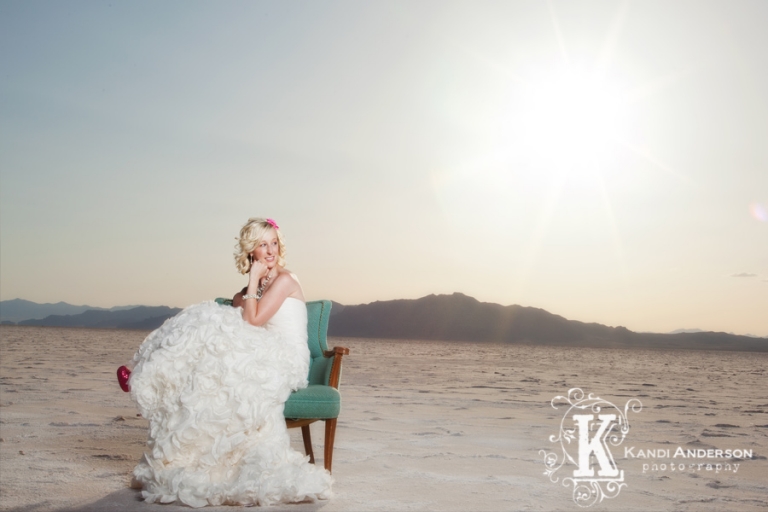 beautiful weddign dress and bride in chair out on the salt flat