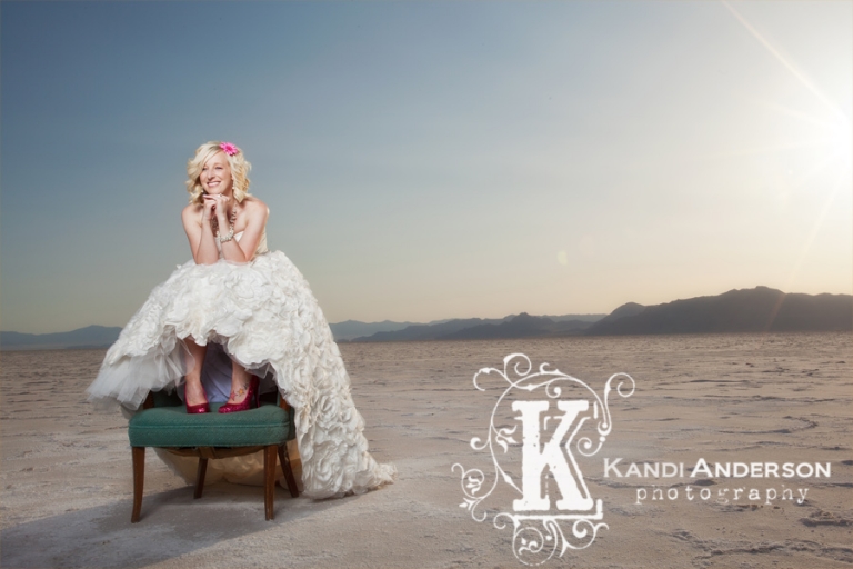 fun bride on chair in the middle of the salt flats in West Wendover