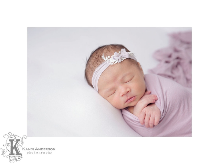beautiful baby girl in lavendar wrap
