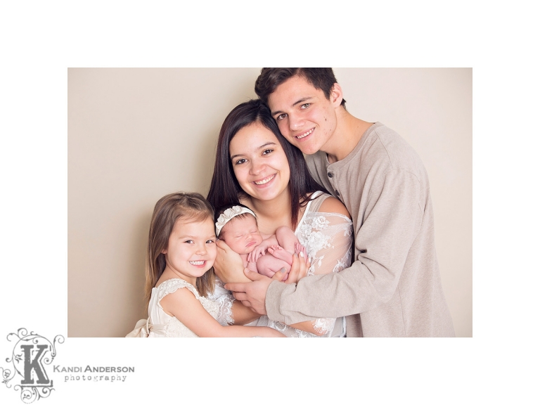 newborn with a family photo session