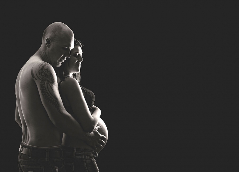 husband and wife intimate maternity photo session